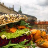 veggie burger with a view behind of Prague