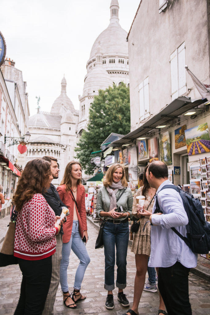 Group of people on a street in Montmartre Hill.