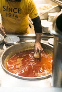 bifana_cooking_process_at_Conga_Restaurant_Porto
