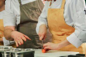 two_people_preparing_food_on_an_Eating_Europe_cooking_class_in_Naples_Campania